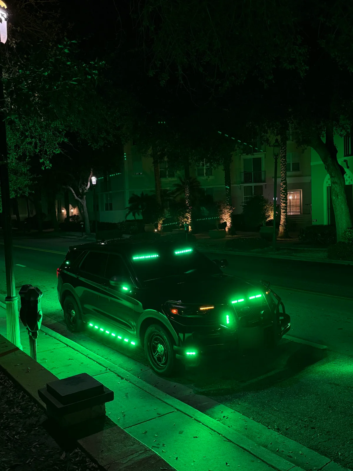 Capital patrol vehicle with green lighting at night